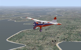 A De Havilland DHC-2 Beaver MKI with tundra tires on a flight northeast of Yellowknife, Canada by summer as tundra tires allow to land outside any airfield