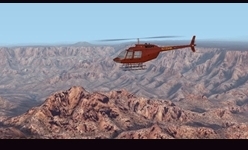 illustration du tutoriel Comment piloter un hlicoptre?: un hlicoptre en vol au-dessus du Grand Canyon